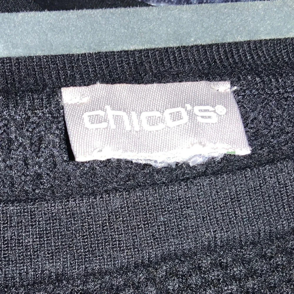 Chico’s striped crew neck sweater measures as L soft textured curved hem